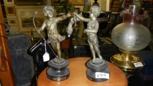 A pair of spelter figures.