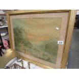 A framed and glazed watercolour lake scene.