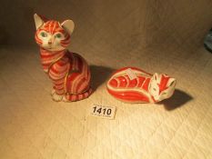 A Royal Crown Derby ginger tom cat and a Royal Crown Derby fox paperweights.
