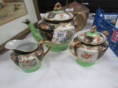 A 3 piece Japanese porcelain tea set.