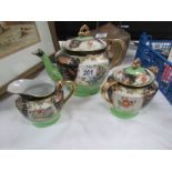 A 3 piece Japanese porcelain tea set.