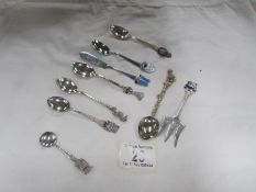 A mixed lot of souvenir spoons etc.