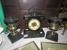 A 3 piece 19th century clock garniture.