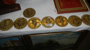 8 circular vintage brass Lincolnshire steam rally plaques.
