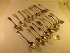 20 hall marked silver spoons, 270 grams.