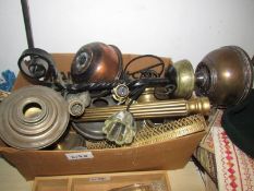 A quantity of brass oil lamp parts.