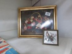 A framed and glazed floral study and a miniature bird study.