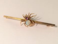 A 9ct gold ladies dress pin/brooch with spider decoration, marked '9ct, L & Co.