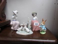 2 NAO girl figures, a NAO geese group and a Beswick Beatrix Potter Peter Rabbit.