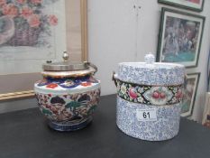 An Ironstone biscuit barrel and a Staffordshire biscuit barrel.