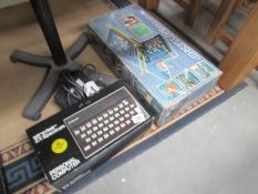 A boxed Sinclair ZX Spectrum and a boxed computer battleships.