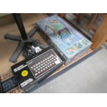 A boxed Sinclair ZX Spectrum and a boxed computer battleships.