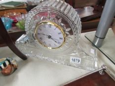 A glass mantel clock.