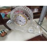 A glass mantel clock.