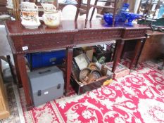 A mahogany console table.