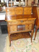A Victorian mahogany inlaid writing desk.