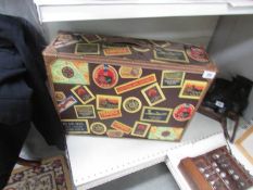 A suitcase with vintage label design.