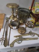 A brass trivet, brass planter, toasting fork etc.