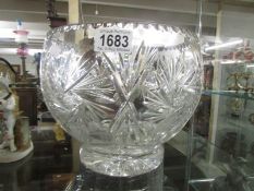 A large heavy cut glass bowl.