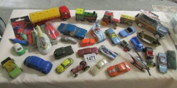 A mixed lot of die cast and plastic vehicles including Schuco, Siku, Solido etc.