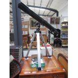 A Celeston power seeker 80E0 telescope.