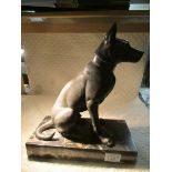 A spelter figure of a dog on marble base.