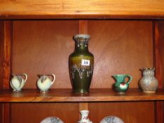 5 items of studio pottery.