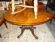 A Victorian mahogany inlaid loo table.