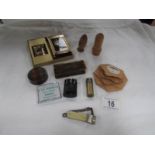 A mixed lot including treen, cigar cutter, boxes, cigarette lighter etc.