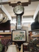 An Ingraham USA banjo clock, mechanical 8 day revers wind in American walnut case.