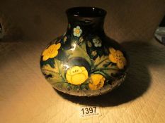 A Moorcroft Buttercup vase.