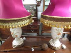 A pair of pottery table lamps with shades,.