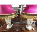 A pair of pottery table lamps with shades,.