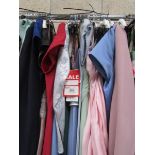 Approximately 21 assorted bridesmaid, evening dresses etc in various sizes.