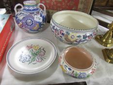 4 items of Poole pottery.