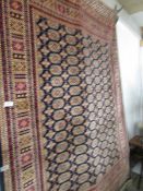 A Bokhara rug, 230 x 160 cm.