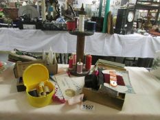 A quantity of vintage sewing accessories including cotton reel stand.