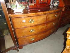 A mahogany bow front 2 over 2 chest of drawers.