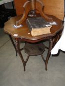 A mahogany occasional table.