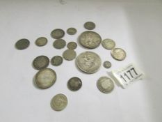 A quantity of pre 1920 silver coins including 1902 crown, George III crown, George IV shillings,