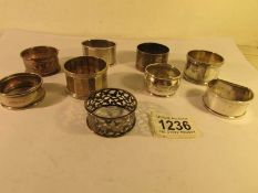8 hall marked silver napkin rings, 165 grams.