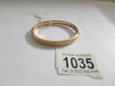 A 9ct gold bangle, 7.5 grams.