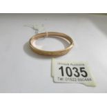 A 9ct gold bangle, 7.5 grams.