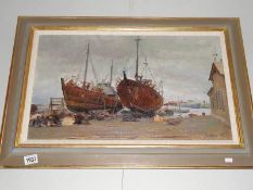 An oil on canvas, boat yard scene, signed Kunnah '49.