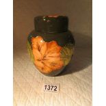 A Moorcroft lidded jar.