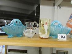 A Mary Gregory Jug, A Mary Gregory beaker and 2 blue glass baskets.