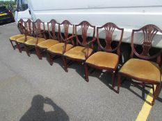 A set of 8 mahogany shield back chairs.