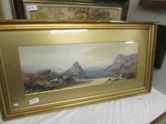 A framed and glazed coastal scene watercolour signed J Rushmere, image 77 x 28 cm.