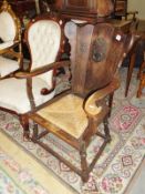 An oak Heraldic carved chair,.