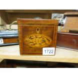 A mahogany inlaid tea caddy.